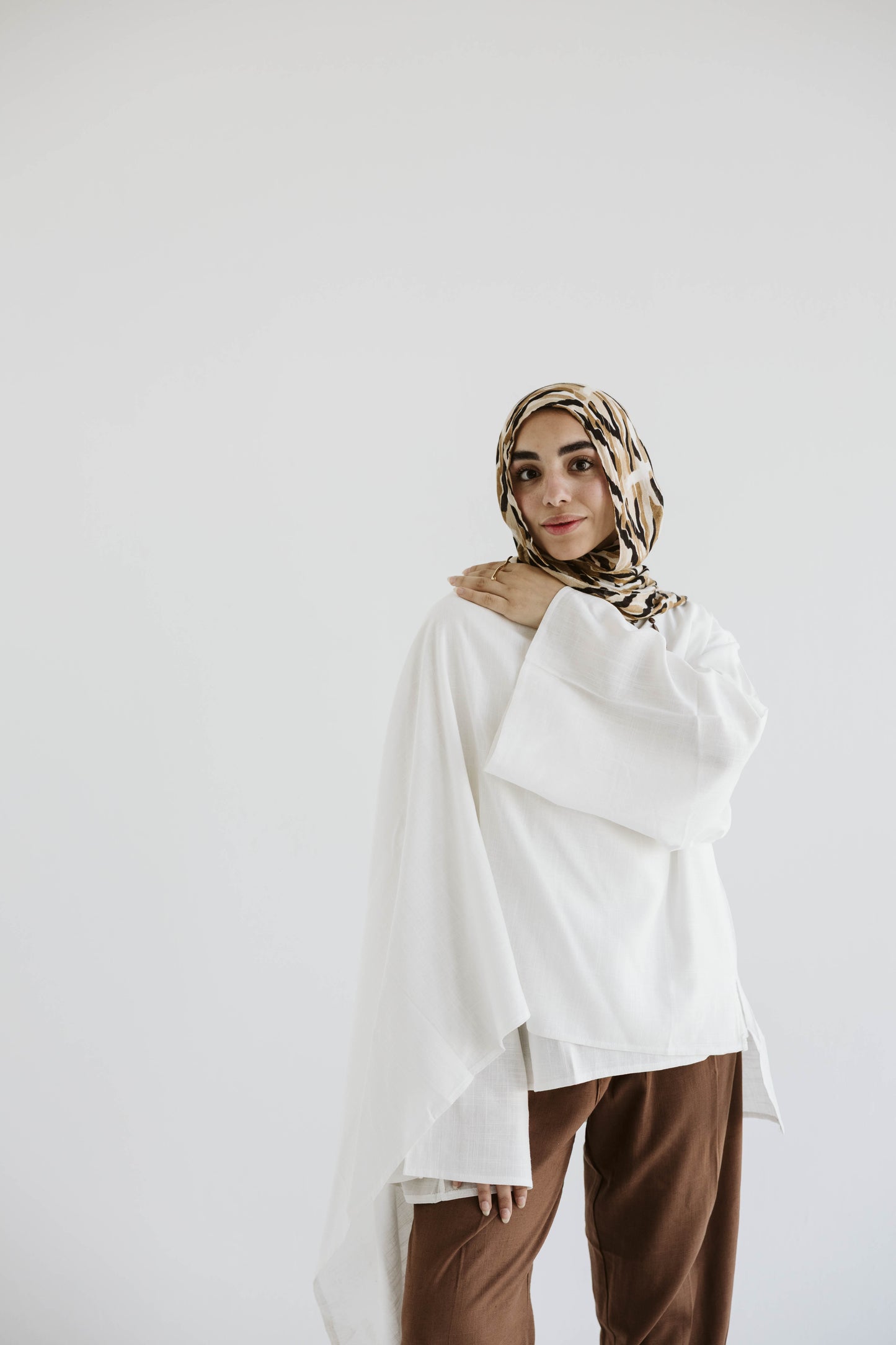 Minimalist White Asymmetrical Cape Top