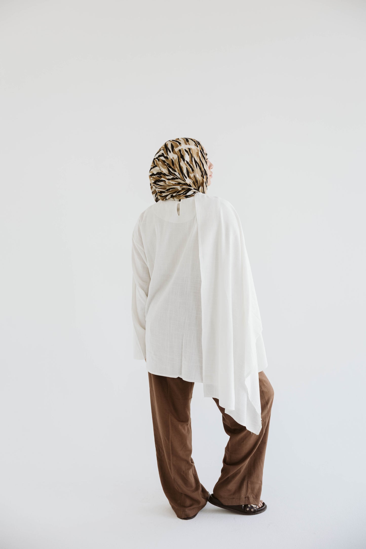 Minimalist White Asymmetrical Cape Top