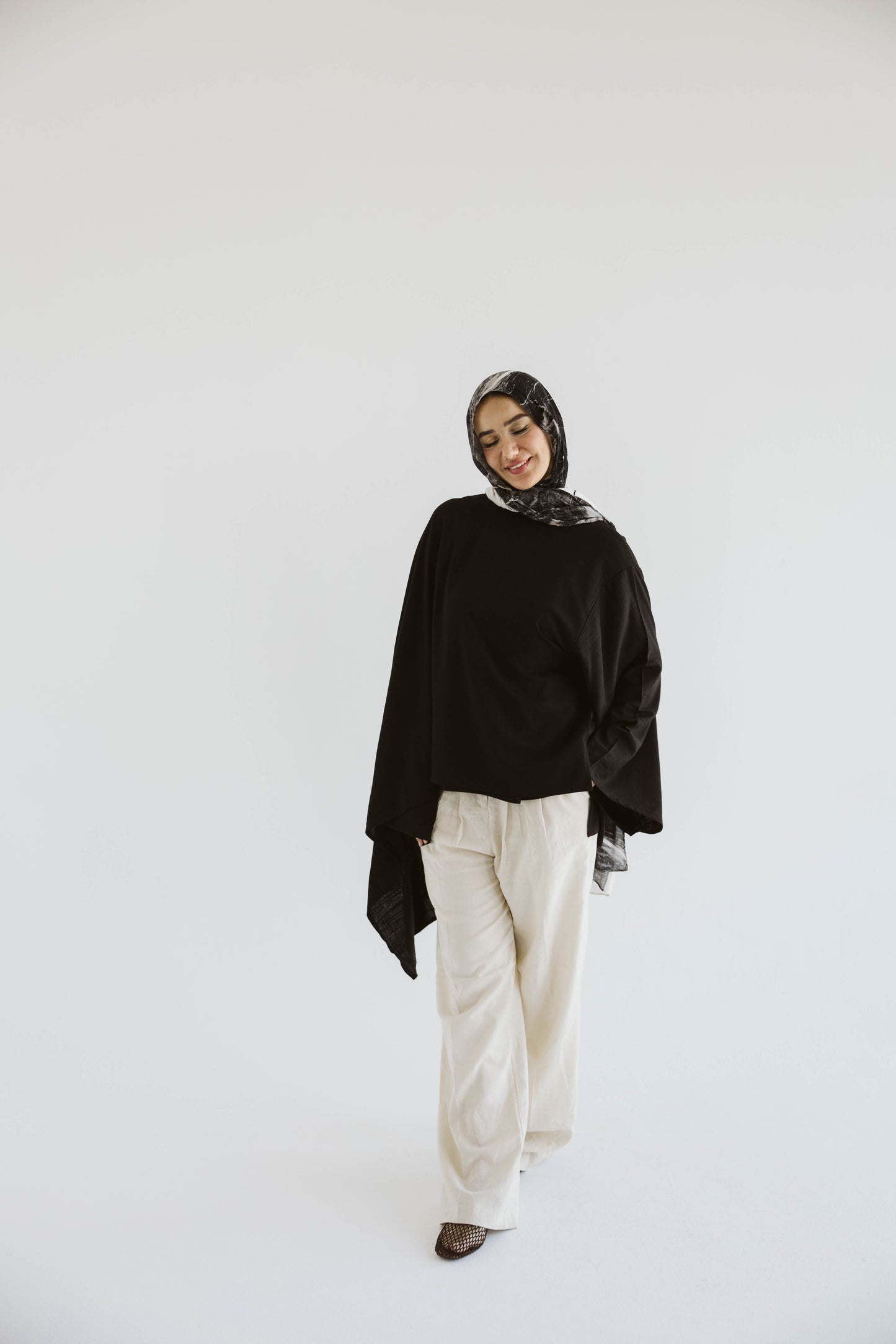 Minimalist Black Asymmetrical Cape Top