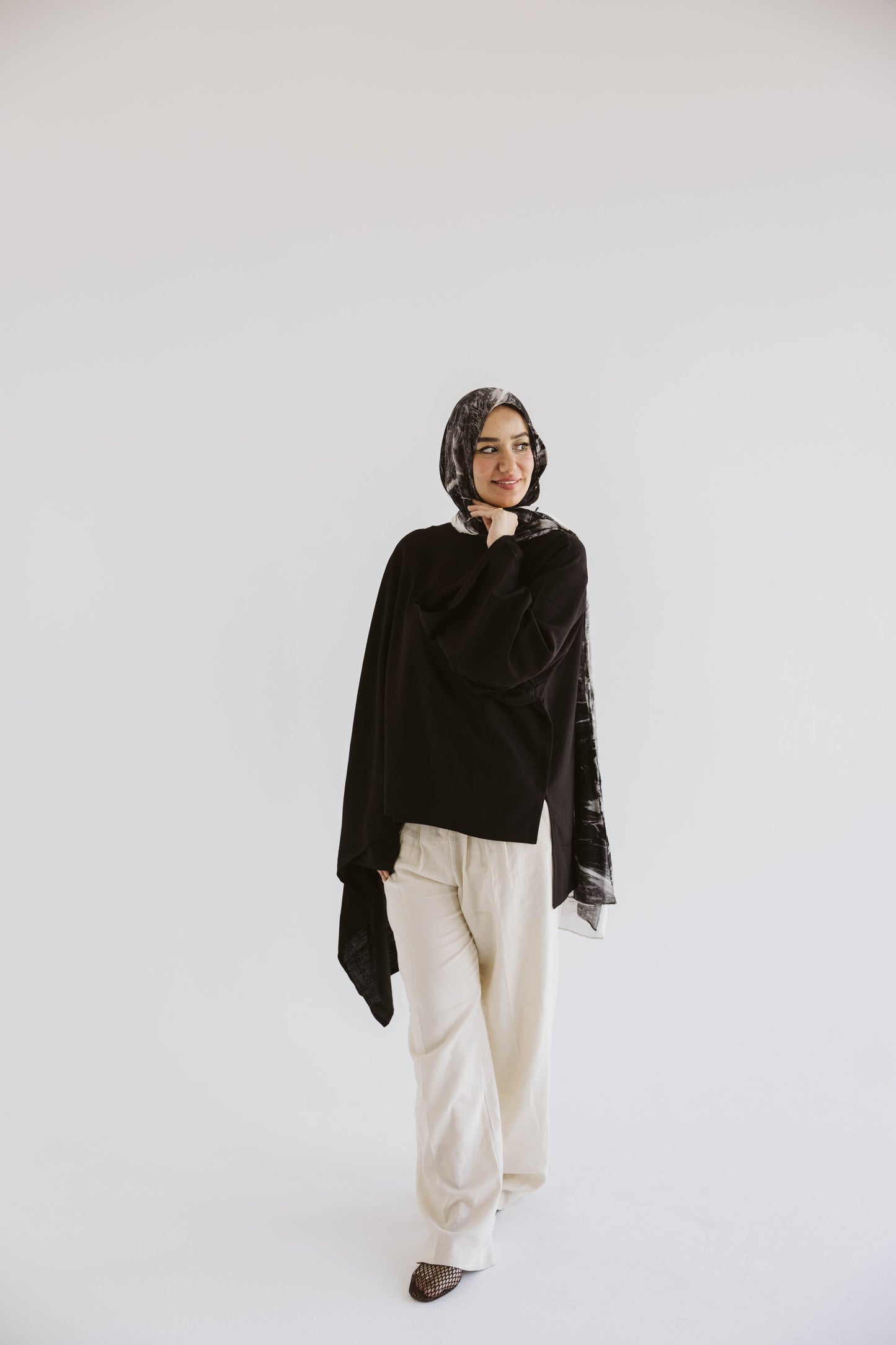 Minimalist Black Asymmetrical Cape Top