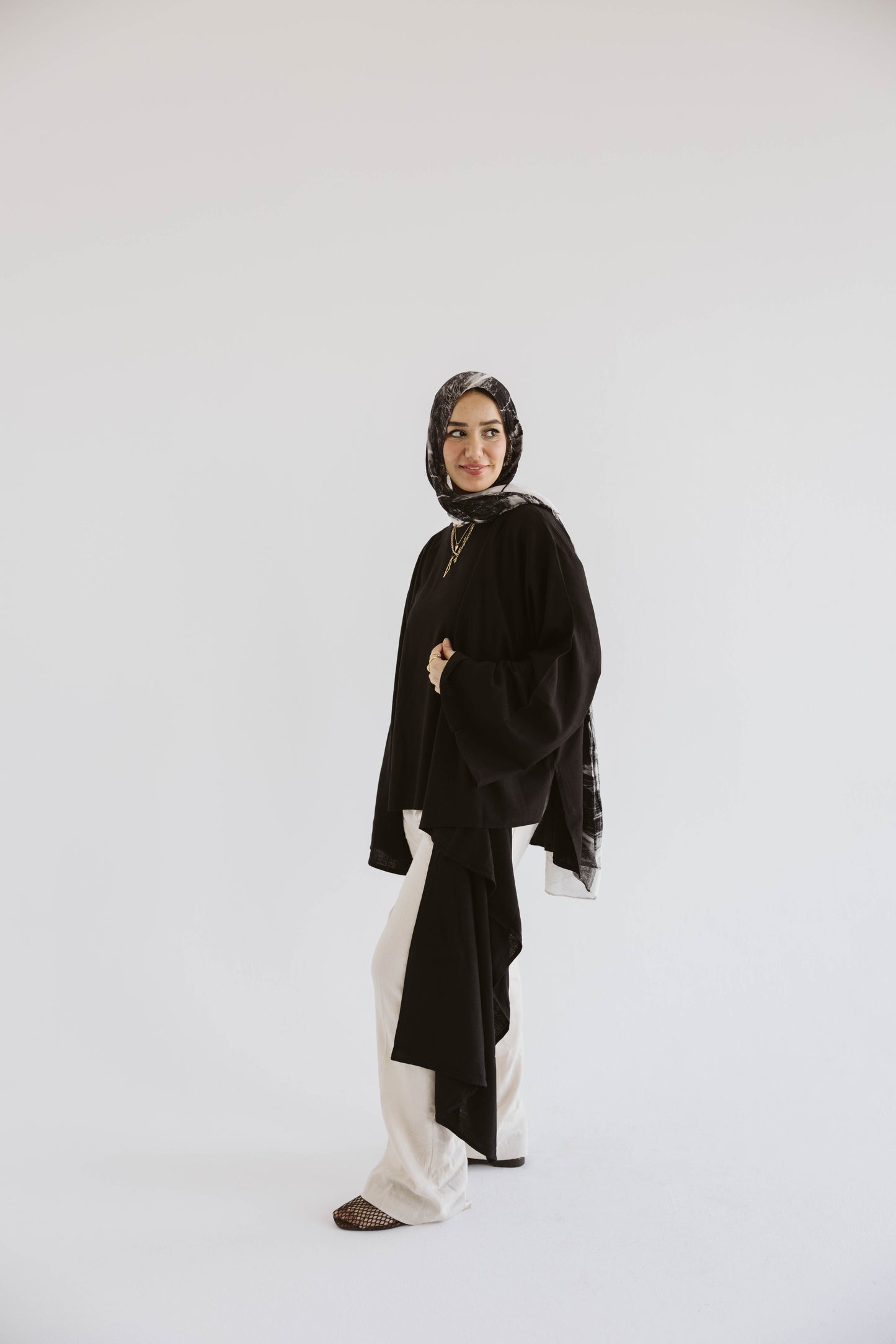 Minimalist Black Asymmetrical Cape Top