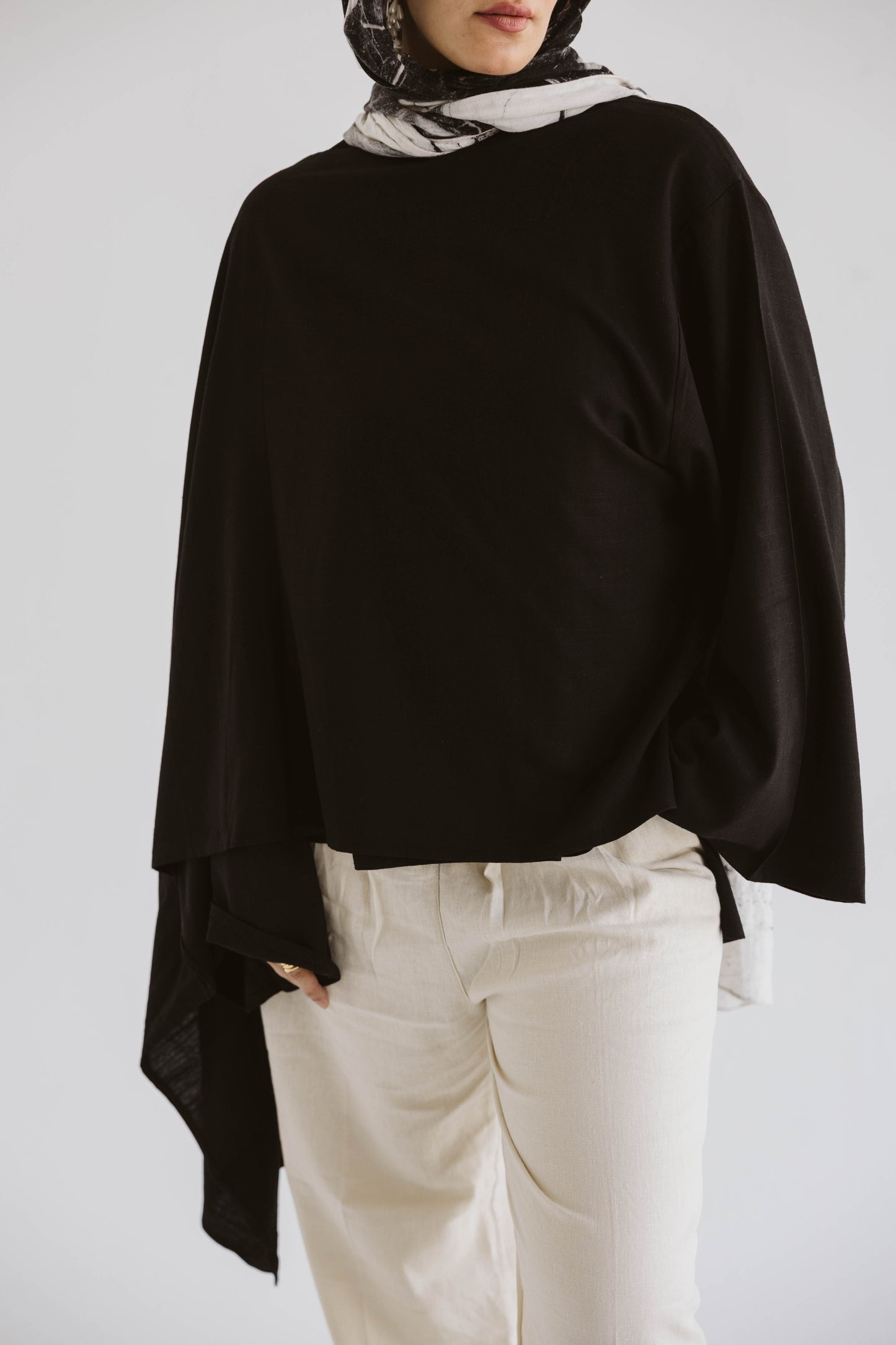 Minimalist Black Asymmetrical Cape Top