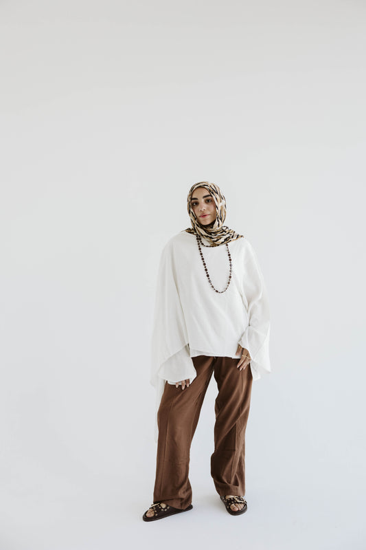 Minimalist White Asymmetrical Cape Top